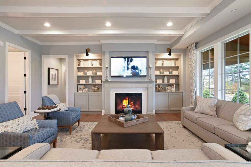 Sitting room painted in grey with white trim.