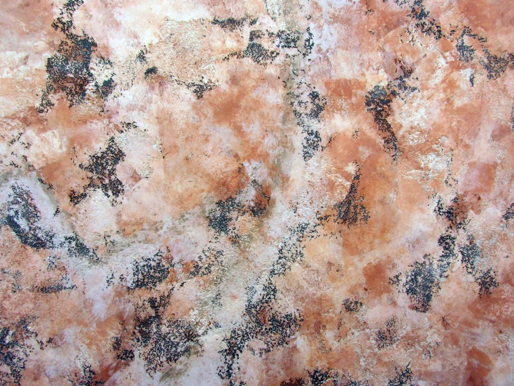 Pink marble faux finish with lots of bold contrasting veining.