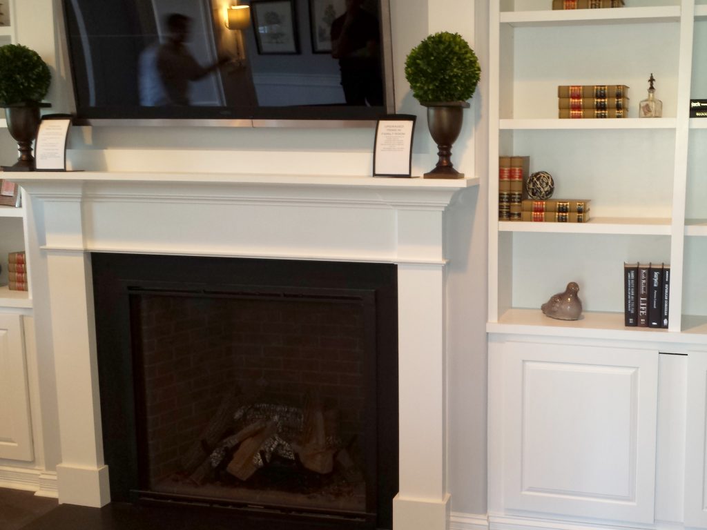 Fireplace and built in bookshelves